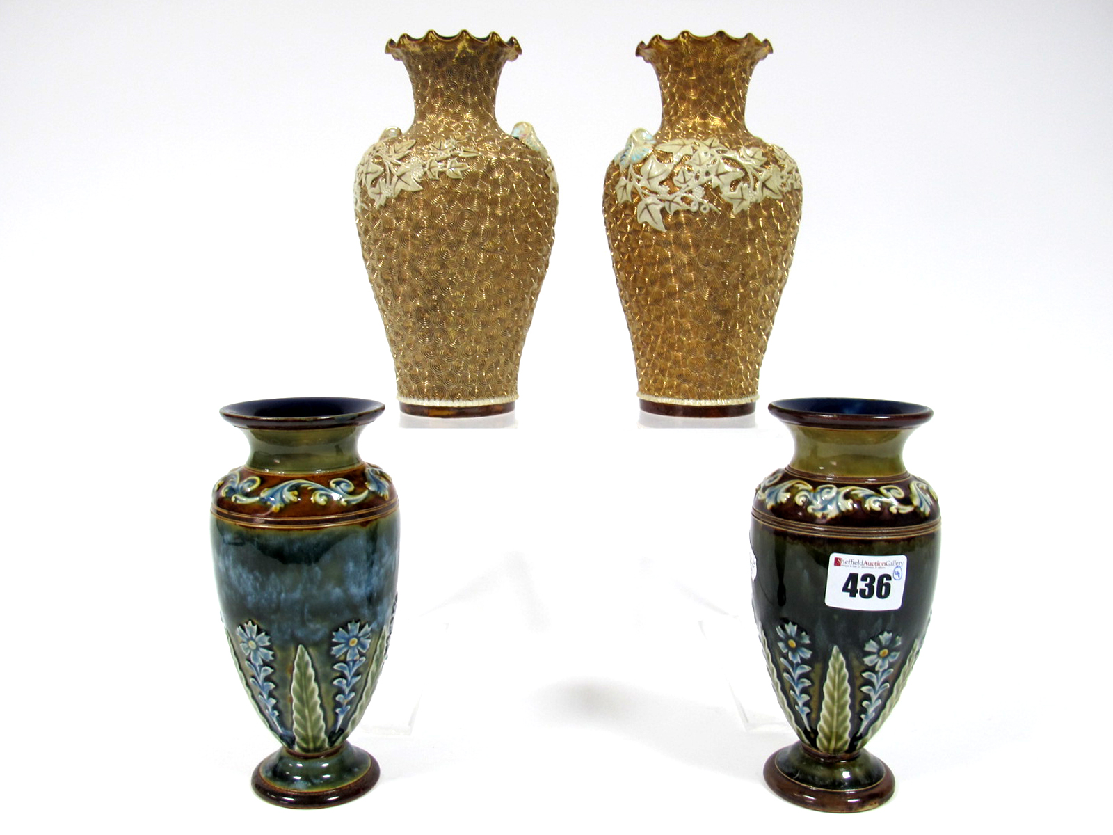 A Pair of Doulton Lambeth Stoneware Vases, of tapered form with outcurved necks, decorated in shades