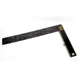A Victorian Exhibition Quality Ebony and Brass Mounted Set Square, the blued blade inscribed