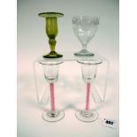 A Pair of XIX Century Wine Glasses, the bell shaped bowls raised on red and white enamel twist stems