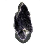 A Large Amethyst Geode, with richly coloured crystals, 49cm high.
