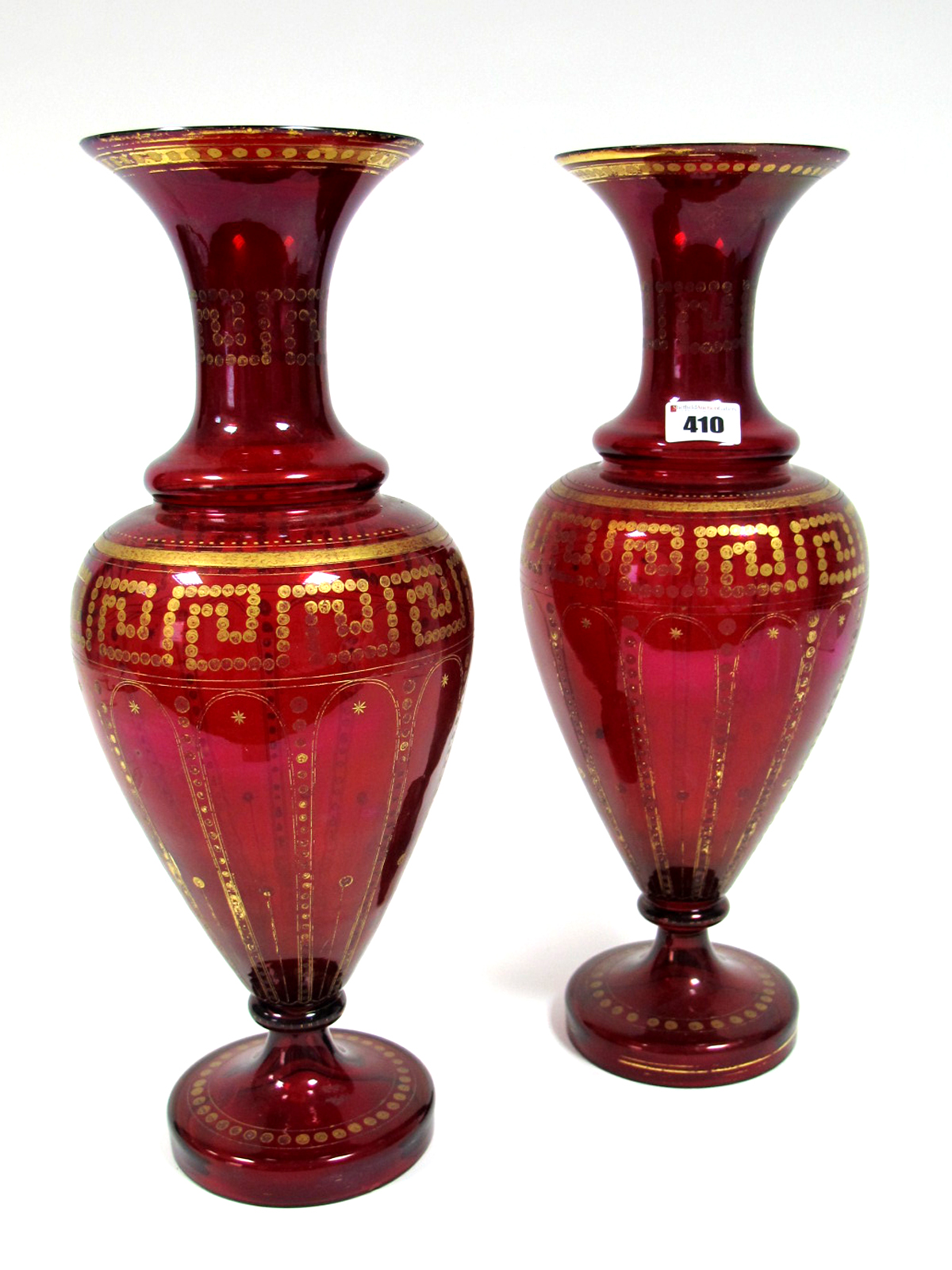 A Pair of XIX Century Ruby Glass Vases, of baluster faceted form, decorated within dot and key