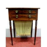 An Early XIX Century Regency Mahogany Work Table, with crossbanded top, two small drawers over