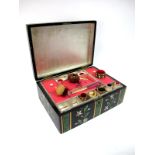 A Mid XIX Century Workbox, lacquered and painted with white flowers between faux marbled bands,