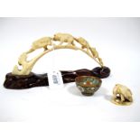 A Late XIX Century Japanese Ivory Bridge Carved with Five Monkeys, hardwood stand, 24cm long; A