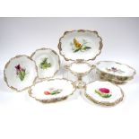 A Mid XIX Century English Porcelain Part Dessert Service, each piece differently painted with a