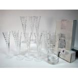 A Set of Nine Carr's of Sheffield Hand Cut Lead Crystal 'Swirl' Champagne Flutes, 27cm high (part