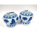 A Pair of XX Century Chinese Porcelain Blue and White Vases and Covers, of shaped globular form,