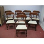 A Set of Eight William IV Mahogany Dining Chairs, comprising two carvers and six single, each with
