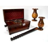 An Early XIX Century Mahogany Tea Caddy, of sarcophagus form with brass inlay and turned handles,