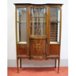 An Edwardian Inlaid Mahogany Display Cabinet, with stepped pediment, central concave section with