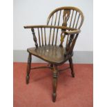 A XIX Century Ash and Elm Windsor Chair, with hooped back, rail supports and pierced splat on turned