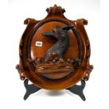 A Late XIX Century Oak Oval Wall Hanging Crest, carved with a fawn above a coronet, all within a