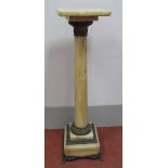 A XIX Century Marble Pedestal, squared top over tapering cylindrical column, with cast ormolu