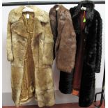 A Full Length Coney Fur Coat; a coney fur jacket and a faux fur coat. (3)