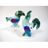 A Herend Porcelain Model of a Rooster, with green fish net body and multi-coloured feathers, on a