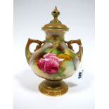 A Royal Worcester Porcelain Two Handled Vase and Cover, of globular footed form, painted with pink