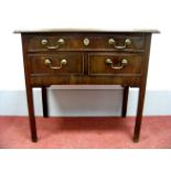 An XVIII Century Mahogany Side Table, with moulded edge and long drawer over two short drawers, on