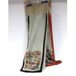 A Late XIX Century Chinese Grey Figured Silk Skirt, couched and embroidered with vases, flowers,