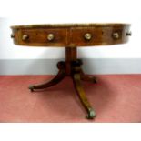 A XIX Century Rosewood Drum Table, with crossbanded circular top inset with green leather sciver,