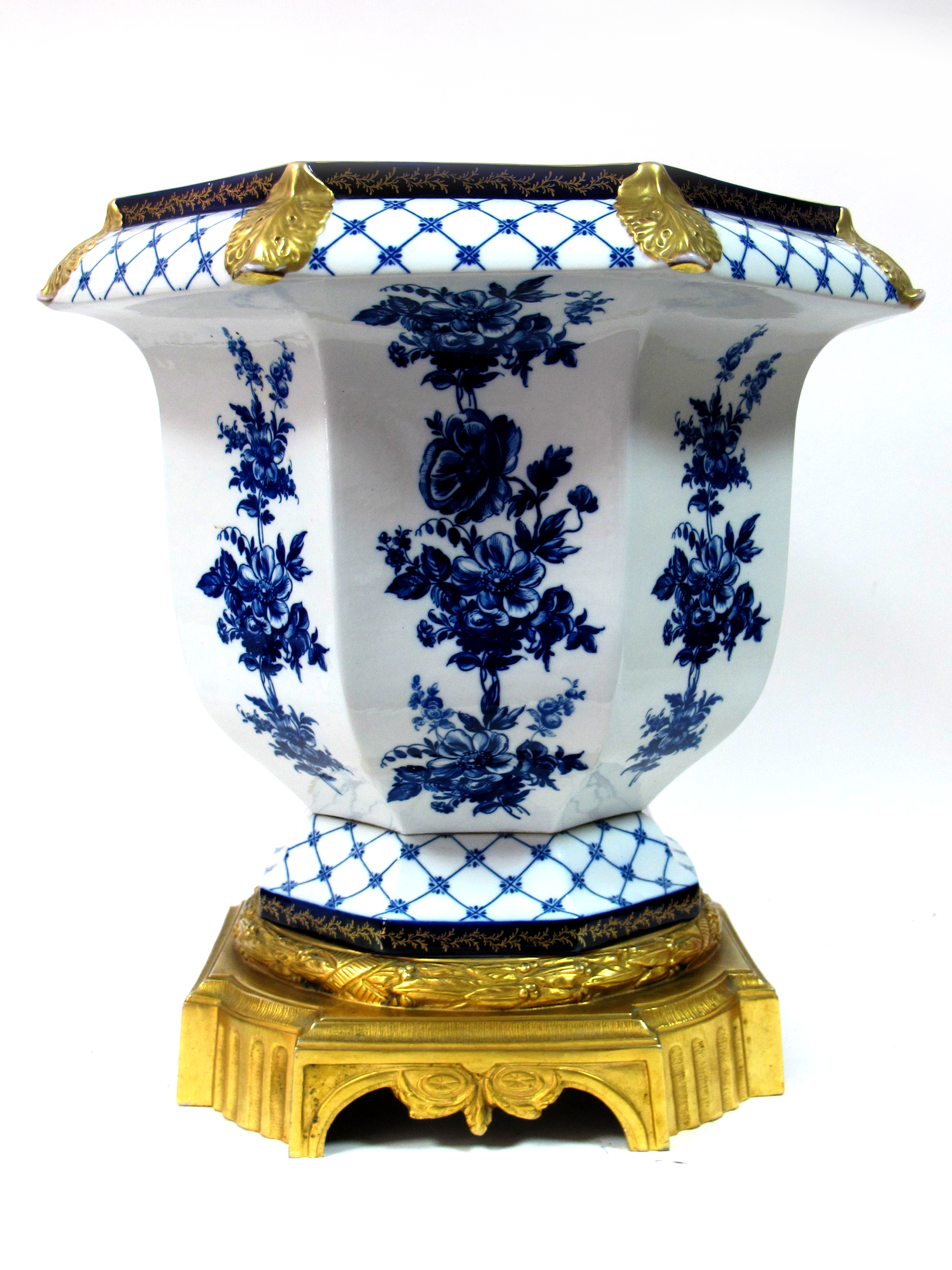 A XX Century French Ormolu-Mounted Porcelain Jardiniére, of octagonal section, blue and white