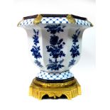 A XX Century French Ormolu-Mounted Porcelain Jardiniére, of octagonal section, blue and white