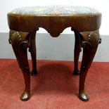 An XVIII Century Style Mahogany Stool, with drop-in seat on cabriole legs with pad feet.