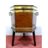 An XVIII Century Mahogany and Brass Bound Cellaret, of hexagonal form with twin brass handles,