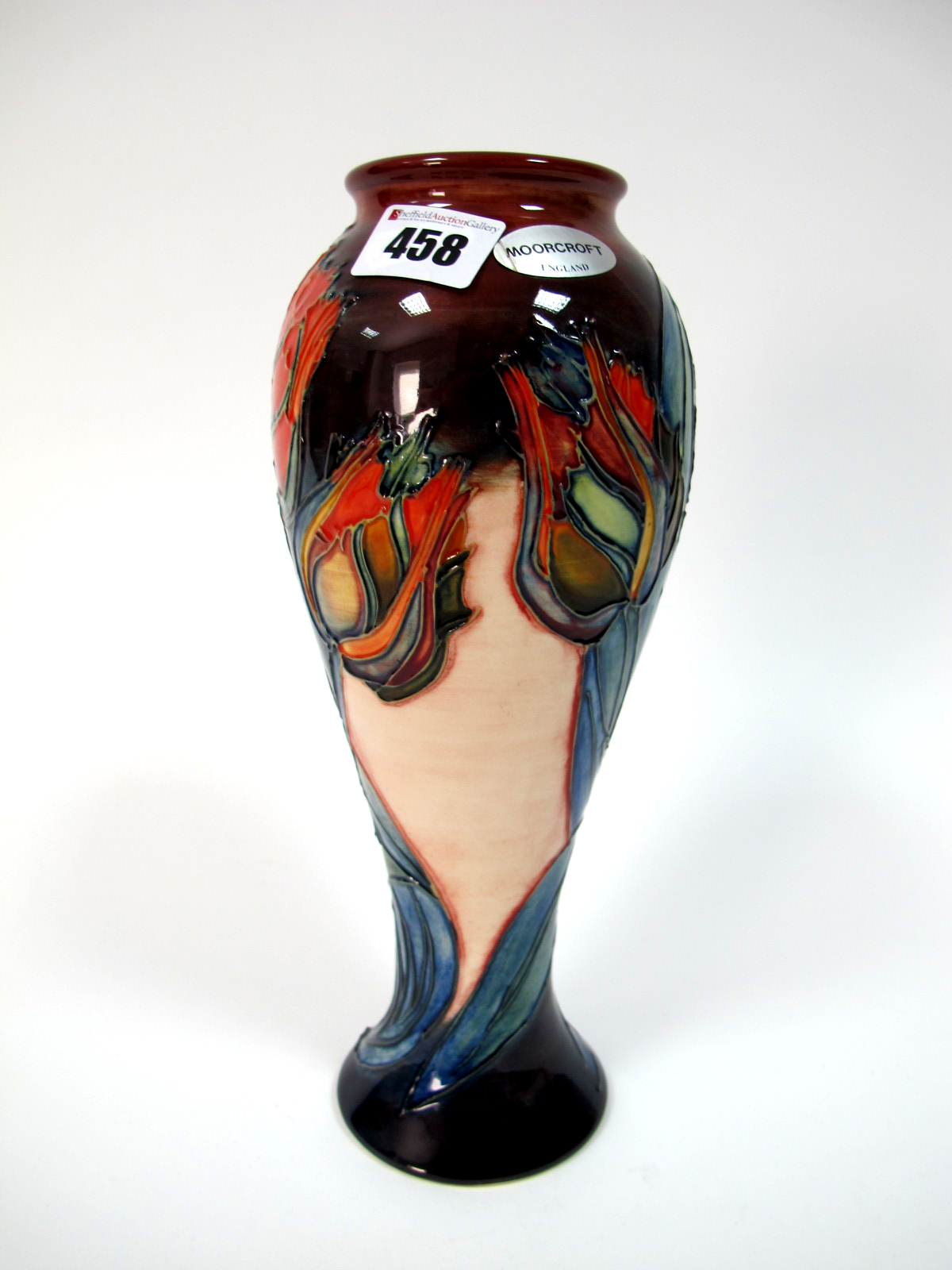 A Modern Moorcroft Pottery Vase, of inverted baluster form, decorated in the Red Tulip pattern