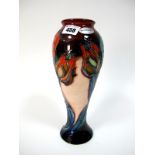 A Modern Moorcroft Pottery Vase, of inverted baluster form, decorated in the Red Tulip pattern