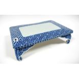 An Early XX Century Japanese Porcelain Low Stand, of rectangular form, painted in blue with