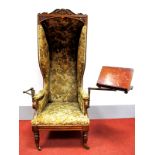 A Mid XIX Century Mahogany Reading Chair, with 'S' shaped carved pediment, upholstered canopy, sides