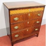An Early XIX Century Mahogany Chest of Drawers, the top with boxwood stringing, fitted with three