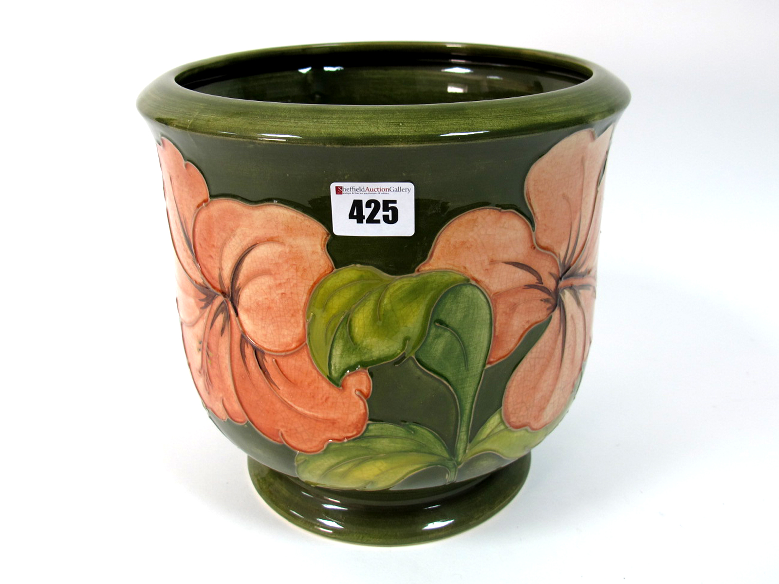 A Mid XX Century Moorcroft Pottery Jardiniére, the 'U' shaped body painted in the coral Hibiscus