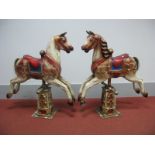 A Pair of Mid XX Century Papier Maché Carousel Horses, with brightly painted features and saddles,