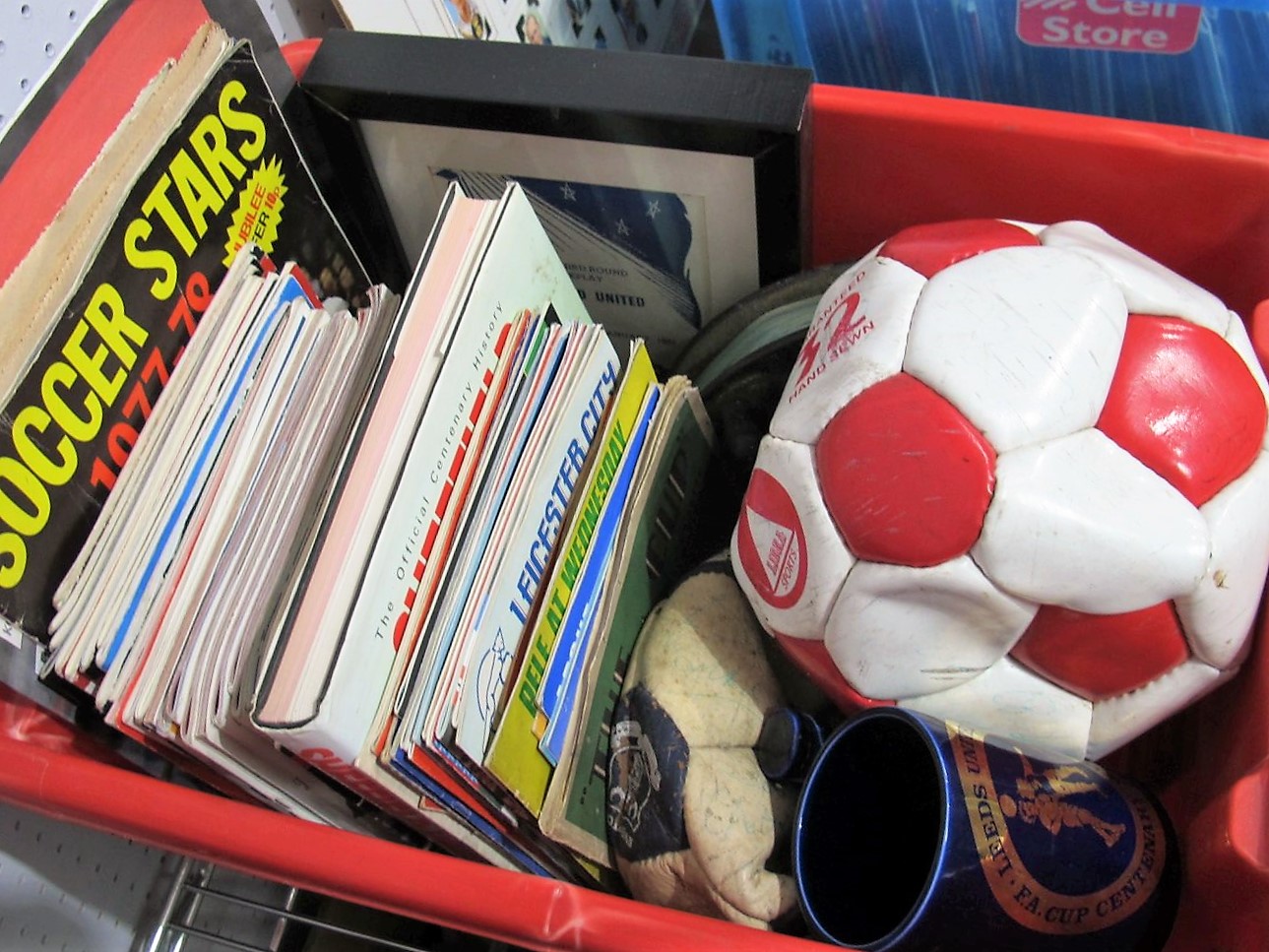 Everton and Nottingham Forest Footballs, quantity of programmes, fishing reels. 'The Cup' Booklet,