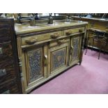 An Early XX Century Oak Sideboard, with pokerwork panelled cupboard doors, and later handles to