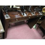 An Oriental Hardwood Hall Table, with three small drawers, on rectangular supports, 130cm x 85cm