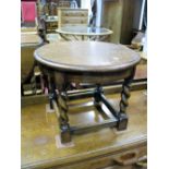 A 1920's Oak Circular Coffee Table, on barley twist legs.