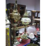 A Converted Oil Lamp, with glass funnel, glass well, urn shaped gilded brass table lamp and one