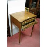 A XX Century Mahogany Side Table, with two small drawers, brass knobs, tapering legs.