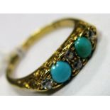 An 18ct Gold Turquoise and Diamond Set Ring, alternately set within scroll carved setting.