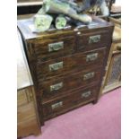 An Oriental Style Chest of Drawers, with two short drawers, three long drawers, panelled sides, (all