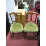 A Set of Four XIX Century Mahogany Chairs, with central splat, upholstered seats on turned and