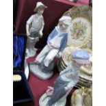 Three Lladro Figurines fisher lad C29J, Sailor E-17MY, boy by Milepost E-14F. (3)