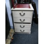 A XX Century Painted Filing Cabinet, with a red leather scriver, crossbanded top, two drawers, on