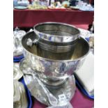 A Plated Punch Bowl, allover decorated in relief, oval twin handled tray, ice bucket, ladle,