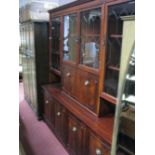 A Mahogany Effect Lounge Unit, with honeycomb bevelled glass doors.