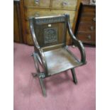 A XIX Century Pine Ecclesiastical Chair, with a panelled back and carved initials AHS solid seat, on