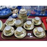 A Noritake Fifteen Piece Coffee Service, circa 1920's with landscape design and gilt highlights,