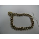 A 9ct Gold Curb Link Bracelet, of uniform design, to heart shape padlock clasp.